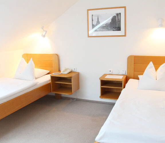 Dvoulůžkový pokoj s oddělenými postelemi